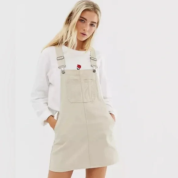 beige overall dress BEIGE SLEEVELESS FITTED DRESS main image 1